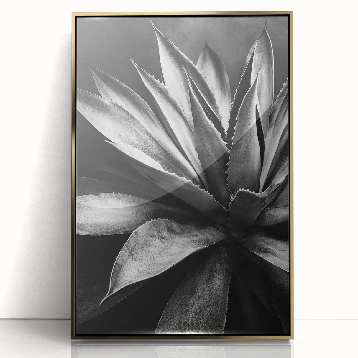 Framed wall art showcasing a vibrant botanical design of succulents in gold-acrylic frame, perfect for enhancing modern interiors and adding a touch of nature.