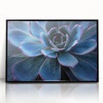 Framed wall art featuring a vibrant botanical design of assorted succulents, set in a sleek black frame, ideal for modern home decor and plant enthusiasts.