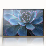 Framed wall art featuring a botanical design of colorful succulents set against a gold-acrylic background, perfect for home decor enthusiasts seeking vibrant nature-inspired artwork.