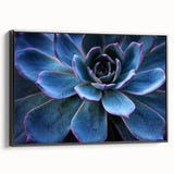 Framed canvas wall art featuring a botanical design of succulents in vibrant colors, showcased from a black side view, perfect for home decor and nature lovers.