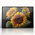 Framed botanical wall art featuring a vibrant sunflower design with a black frame, showcasing intricate details and rich colors, perfect for home decor.