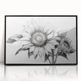 Framed wall art collection showcasing a vibrant botanical sunflower design with a black frame, perfect for brightening home decor and enhancing living spaces.