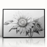 Framed wall art collection showcasing a vibrant botanical sunflower design with a black frame, perfect for brightening home decor and enhancing living spaces.