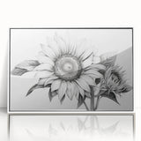 Framed acrylic wall art featuring a vibrant sunflower design in a botanical style, set against a white background, perfect for brightening any interior decor.