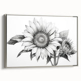 Framed canvas wall art showcasing a botanical sunflower design with vibrant yellow petals and a silver frame, adding a modern touch to home decor.