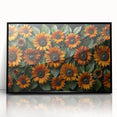 Framed wall art featuring a vibrant sunflower botanical design with a black frame, showcasing bright yellow petals against a clean background, perfect for home decor.