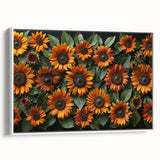 Framed botanical wall art featuring a vibrant sunflower design on canvas, displayed in a stylish white frame, ideal for brightening home decor and nature-themed interiors.