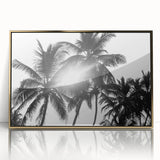 Framed botanical wall art featuring a vibrant design of flowers and trees, set in a sleek gold frame, ideal for adding elegance to home decor.