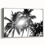 Framed botanical wall art featuring a collection of flowers and trees in elegant silver tones, showcasing intricate details and textures, perfect for home decor.
