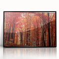 Framed wall art featuring a botanical design of colorful flowers and trees, displayed in a sleek black frame, perfect for modern home decor.