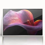 Framed wall art featuring a vibrant tropical botanical flower design, showcasing intricate details in vivid colors against a sleek white background, perfect for home decor.
