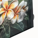 Close-up of vibrant botanical tropical flower wall art design featuring detailed petals and lush greenery, perfect for home decor or gallery display.