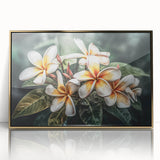 Framed wall art showcasing a vibrant botanical tropical flower design in gold-accented acrylic, perfect for adding a touch of elegance to any interior decor.