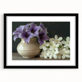 Tropical botanical wall art collection featuring vibrant flowers in a black frame with a mat. Ideal for enhancing home decor with a botanical theme.