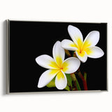 Framed wall art showcasing a vibrant botanical tropical flower design with silver accents, perfect for enhancing modern decor in living spaces or offices.
