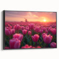 Framed botanical wall art showcasing a vibrant tulip design in shades of pink and yellow, set against a sleek black frame, ideal for modern decor.