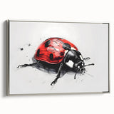 Framed wall art featuring a vibrant ladybug design on canvas, displayed from a side view with a sleek silver frame, perfect for nature lovers and home decor enthusiasts.