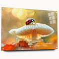 Close-up of a ladybug-themed wall art piece designed for insect and arachnid enthusiasts, featuring vibrant colors and an acrylic glass finish, displayed with pins for mounting.