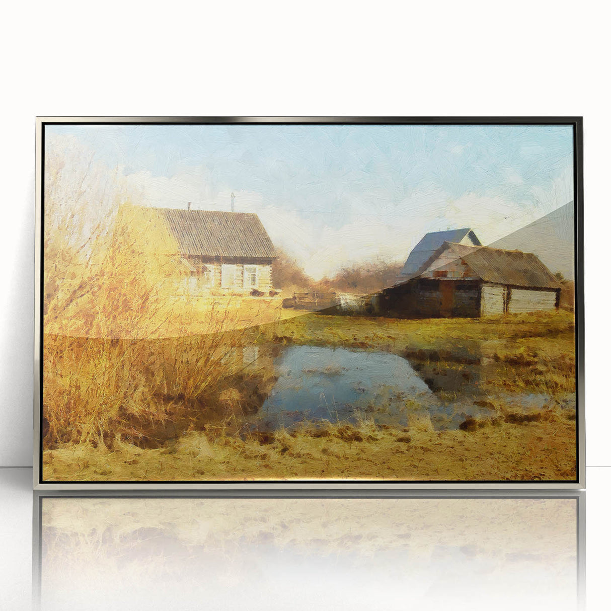 Framed wall art collection showcasing a serene landscape with a rustic barn, set in a silver frame. Perfect for adding a touch of countryside charm to any room.
