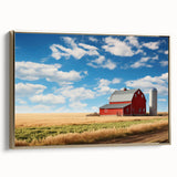 Framed canvas wall art showcasing a serene landscape with a rustic barn, accented by gold tones, perfect for home decor and enhancing interior aesthetics.