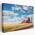 Stretched canvas wall art showcasing a scenic landscape with a rustic barn, featuring vibrant colors and intricate details, ideal for enhancing home decor and creating a cozy atmosphere. Perfect for farmhouse-style interiors or nature-inspired themes.