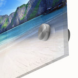 Close-up of a vibrant acrylic wall art piece showcasing a serene beach landscape with colorful skies and gentle waves, ideal for home decor.