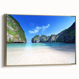 Framed wall art featuring a vibrant beach landscape design with golden accents, showcasing a serene ocean view and a clear blue sky, perfect for home decor.