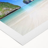 Vibrant rolled canvas showcasing a serene beach landscape with golden sands and turquoise waters, perfect for enhancing coastal-themed decor in living spaces.