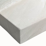 Close-up of a stretched canvas wall art piece depicting a vibrant beach landscape at sunset, showcasing rich colors of orange, pink, and blue in the sky with gentle waves lapping at the shore, perfect for enhancing home decor.