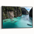 Framed canvas wall art showcasing a serene beach landscape with vibrant colors and intricate details, set in a sleek black frame for modern decor.
