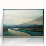 Framed wall art showcasing a serene beach landscape with vibrant colors and acrylic finish, elegantly displayed with a stylish silver frame, perfect for home decor.