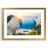 Framed wall art showcasing a serene beach landscape with vibrant colors, featuring a gold mat and elegant frame, perfect for home decor enhancement.