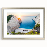 Framed wall art collection showcasing serene beach landscapes in a silver mat, perfect for enhancing home decor with a coastal theme. Ideal for living rooms or offices.