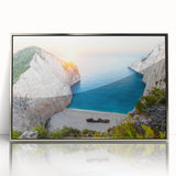 Framed acrylic wall art featuring a serene beach landscape with vibrant colors, set in a sleek silver frame, perfect for coastal-themed decor.