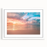 Framed wall art collection featuring serene beach landscapes in soft pastel colors, displayed in a white matte frame, ideal for coastal-themed decor.