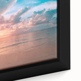 Framed canvas wall art showcasing a vibrant beach landscape design, featuring calming blue ocean waves and sandy shores, ideal for home decor enhancement.
