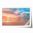 Vibrant rolled print of a serene beach landscape featuring soft waves and golden sand, ideal for coastal decor, packaged securely in a cardboard tube.