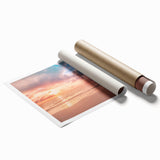 Vibrant rolled print showcasing a serene beach landscape with soft waves and golden sand, ideal for home decor. The artwork captures a calming coastal scene.