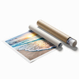 Rolled print of a serene beach landscape featuring soft pastel colors, ideal for home decor. The artwork captures tranquil ocean waves and a sunset sky, perfect for relaxation and coastal aesthetics.