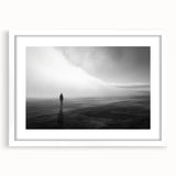 Elegant white-framed wall art featuring a serene beach landscape, showcasing soft sand and gentle waves, perfect for enhancing coastal-themed interiors.