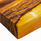 Close-up of a vibrant stretched canvas wall art piece showcasing a serene beach landscape with soft waves and a colorful sunset, perfect for home decor.