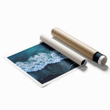 Vibrant beach landscape wall art print showcasing a serene ocean view with soft waves and golden sand, rolled for easy display and shipping. Ideal for coastal decor.