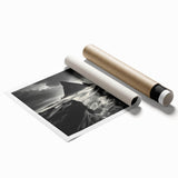 Vibrant rolled print of a serene beach landscape with golden sands and turquoise waves, perfect for home decor. Ideal for coastal-themed interior design.