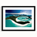 Black-framed wall art featuring a serene beach landscape scene with soft waves and golden sand, ideal for home decor or office spaces, enhancing tranquility.