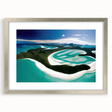 Framed wall art design showcasing a serene beach landscape with vibrant colors, silver matting, and a modern aesthetic, perfect for home decor enhancement.
