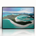 Framed acrylic wall art showcasing a serene beach landscape, featuring vibrant colors and intricate details, ideal for modern home decor. Black frame enhances the visual appeal and complements various interior styles.