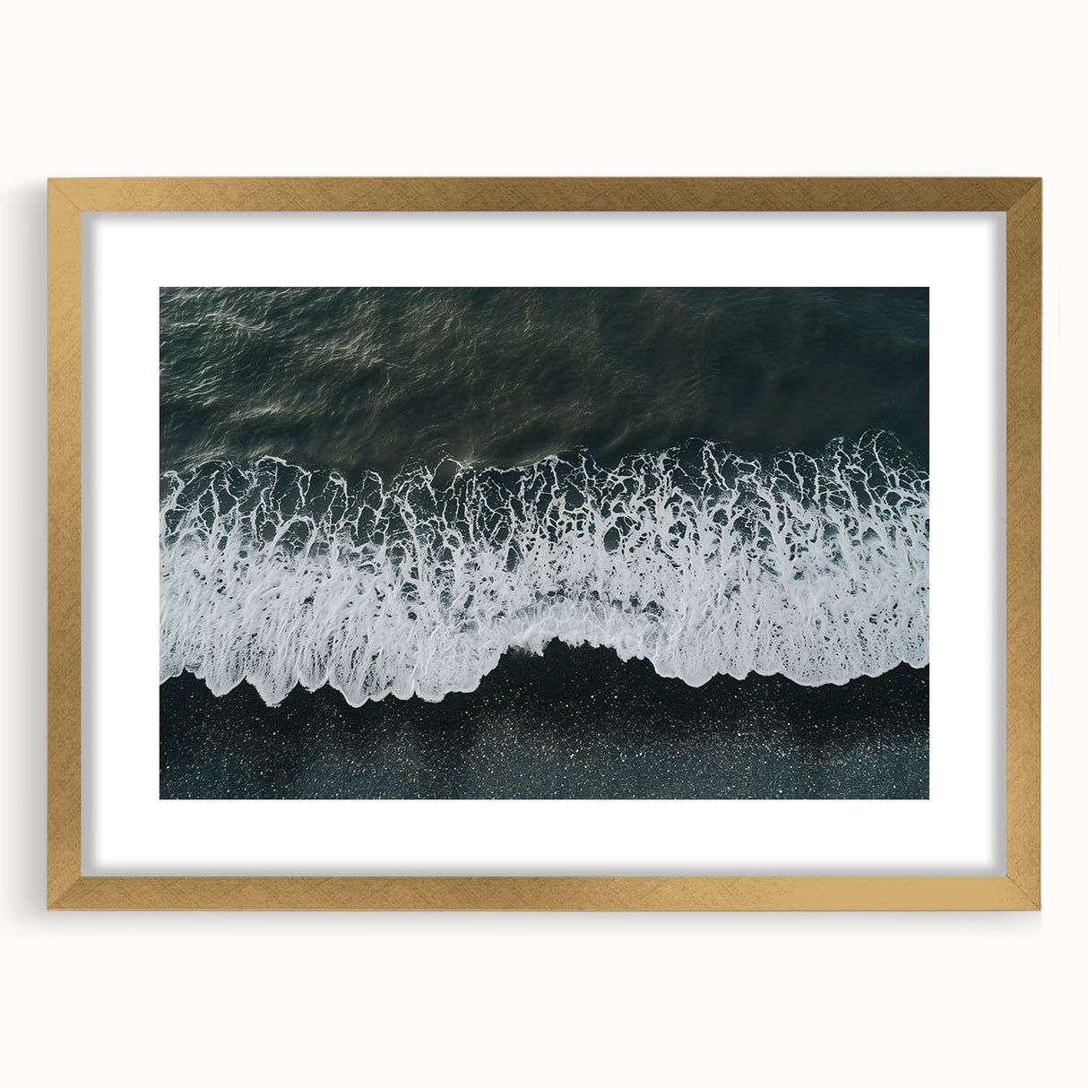Framed wall art featuring a serene beach landscape with golden matting, perfect for home decor. The tranquil colors evoke a sense of calm and relaxation.