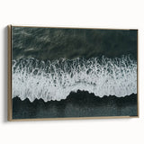 Framed canvas wall art showcasing a serene beach landscape, featuring soft golden hues and gentle waves, perfect for home decor and coastal themes.