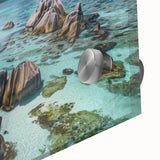 Close-up of a vibrant acrylic wall art piece showcasing a serene beach landscape, featuring soft blues and sandy tones, ideal for enhancing modern home decor.