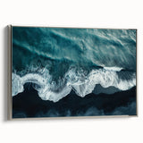 Framed canvas wall art showcasing a serene beach landscape with vibrant colors, set in a sleek silver frame, perfect for coastal-themed decor. Ideal for enhancing living spaces.